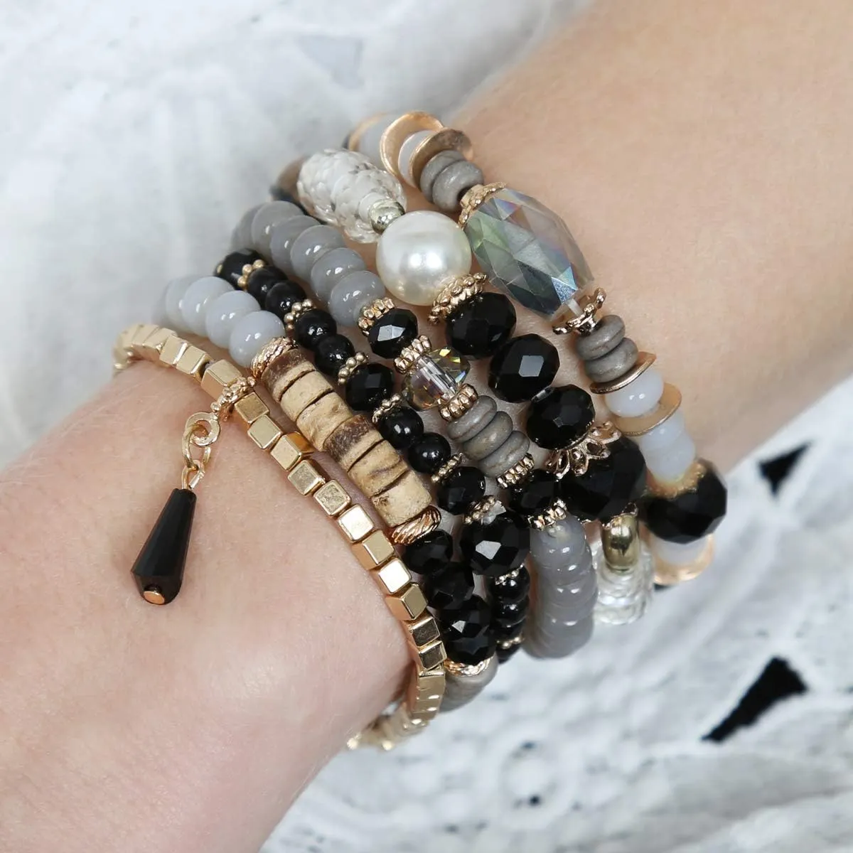 RIAH FASHION Bead Multi Layer Versatile Statement Bracelets - Stackable Beaded Strand Stretch Bangles Sparkly Crystal Mix, Tassel Charm